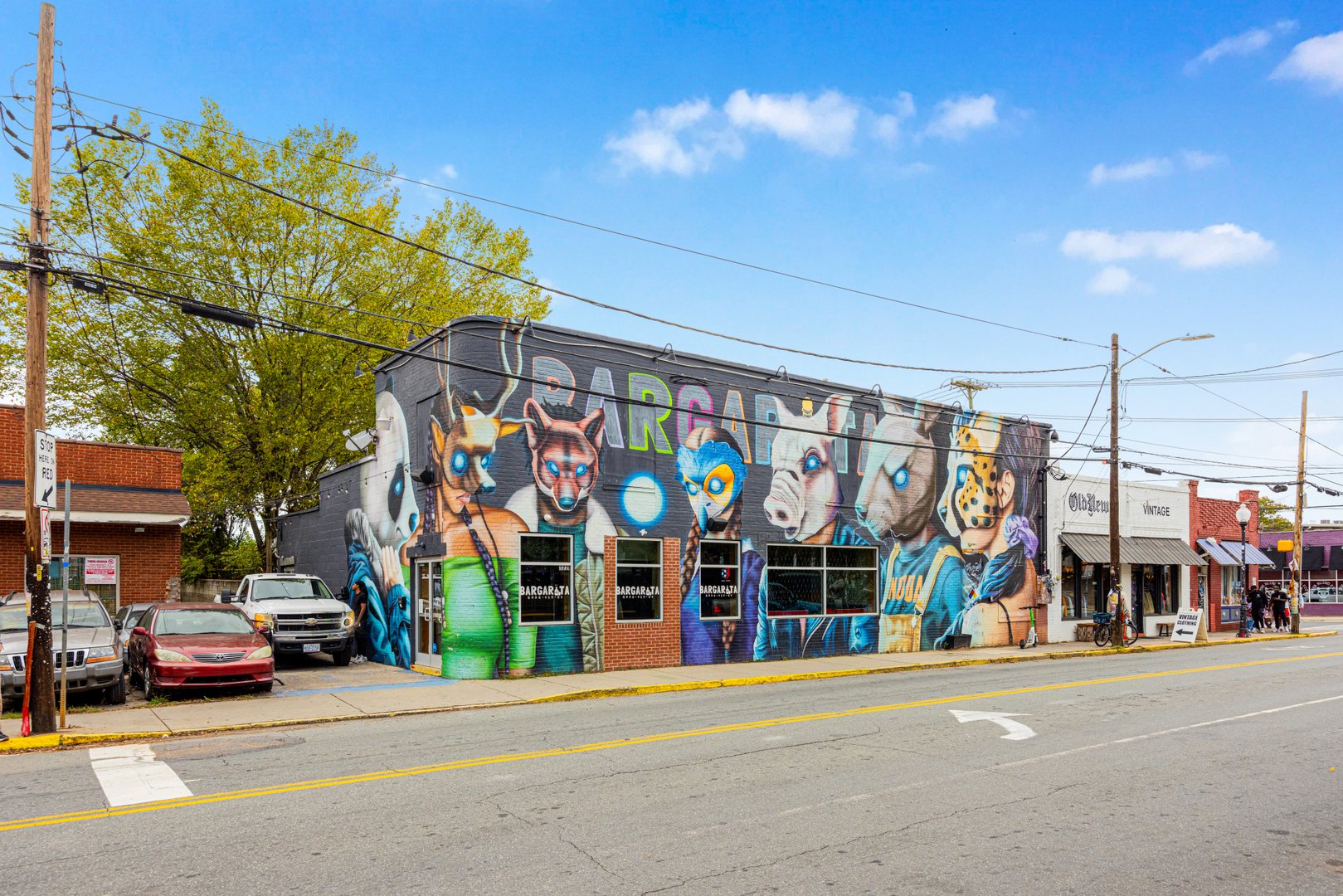 This neighborhood is a canvas of color, creativity, and character